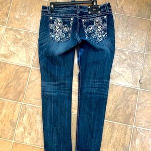 Women’s blue jeans with design on back pockets